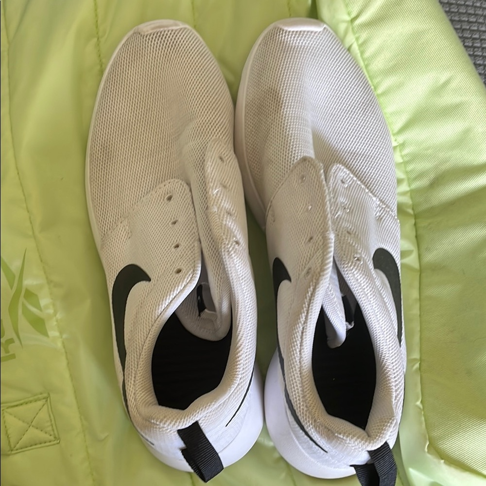 Nike White and Black Slip-On Sneakers with Swoosh